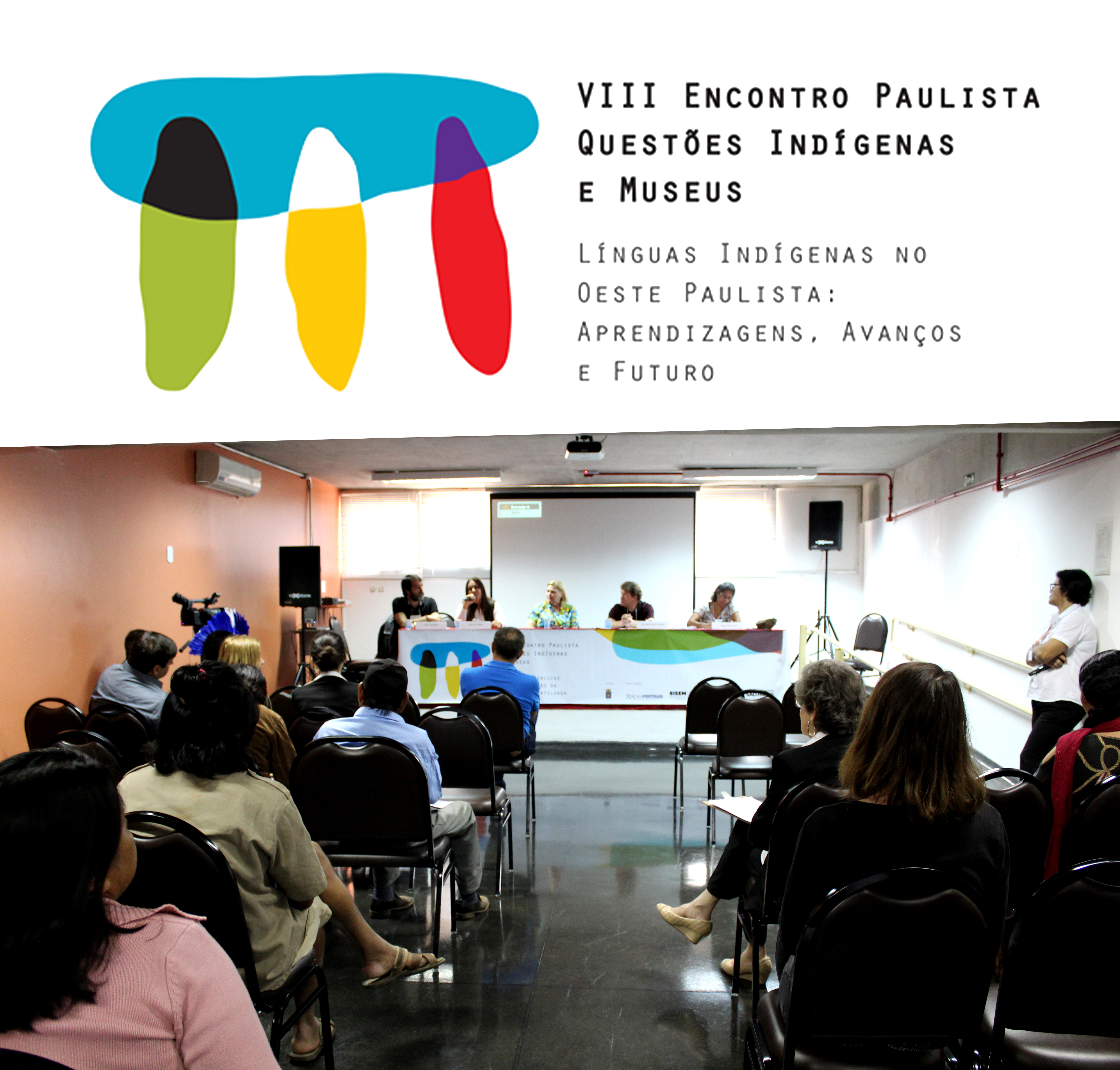 #PraCegoVer - Descrição da imagem para cegos: a imagem mostra o logo da oitava edição do Encontro Paulista Questões Indígenas e Museus no topo e abaixo a foto de uma sala repleta de pessoas. O público, que está de costas para a foto, está sentado em cadeiras pretas, e à frente está uma bancada branca com quatro pessoas sentadas.