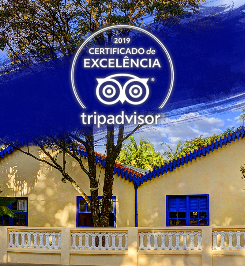 #PraCegoVer - Descrição da imagem para cegos: a imagem mostra a fachada do Museu Casa de Portinari e no topo, em cima de uma faixa azul, está o logo do certificado do TripAdvisor.